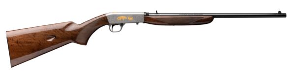 Side view of a polished wooden-stock double-barrel shotgun with gold engraving on the receiver.