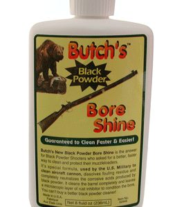 Bottle of Butch's Bore Shine Black Powder cleaner; label shows a rifle image and a bear logo on a light background.