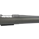 Bolt-action rifle with a gray synthetic stock and a long rifled barrel, shown in profile by a shooter’s view.