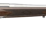 Bolt-action hunting rifle with a polished metal barrel and checkered wooden stock