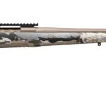 Side view of a camouflage-pattern bolt-action rifle with a long beige barrel and top tactical rail, no scope attached.