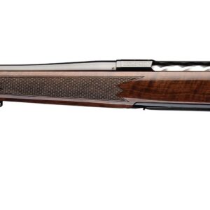 Long bolt-action rifle with a polished wooden stock and checkered grip, photographed from the side against a white background.