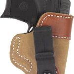 Compact black handgun tucked into a tan leather holster with white stitching on the hip.