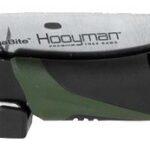 Compact folding utility knife (box cutter) with a black and green body, exposed blade on the left, and a belt clip on the bottom.