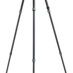 Black adjustable camera tripod with three extendable legs and a top mounting head, standing upright.