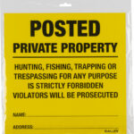 Bright yellow 'POSTED PRIVATE PROPERTY' sign warning that hunting, fishing, trapping or trespassing is forbidden; violators will be prosecuted, with blank lines for name and address.