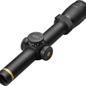 A riflescope with elevation and windage adjustment knobs mounted on a tube, viewed from an angle.