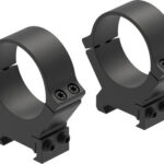 Two black rifle scope rings with mounting bases, shown from an angled perspective.