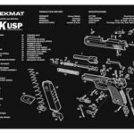 Exploded schematic of a HK USP pistol printed on a TekMat mat, with numbered parts and a parts list on the left against a black background.