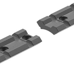 Two gray LEGO Technic-style connector pieces with central circular holes and stepped ridges, viewed from above.