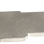 Flat gray metal tool shaped like a key, with a rounded right end and small notches along the bottom edge