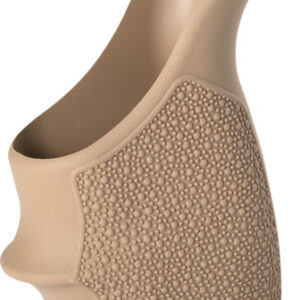 Beige textured Hogue handgun grip panel with raised stippled surface for a secure hold.