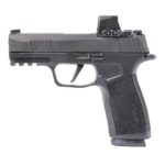 Compact semi-automatic pistol with a mounted red dot sight and textured grip, shown in profile.
