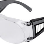 Clear safety glasses with black arms and vented side panels for eye protection on the job site or in a lab.