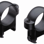 Pair of black rifle scope rings used as clamp mounts for a scope on a rifle?