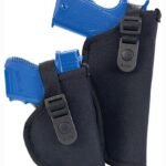 Two blue handgun magazines stored in black fabric holster pouches with buckle straps.