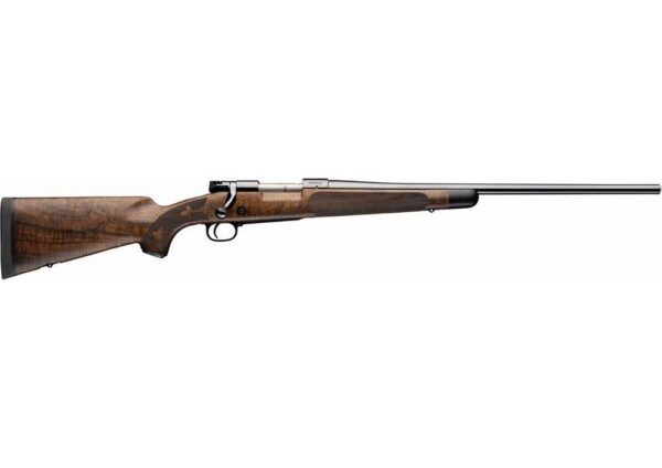 Side view of a bolt-action rifle with a polished wooden stock and long metal barrel.