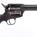 Side view of a black, six-shot revolver with a long barrel and curved grip.