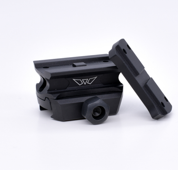 Black rail-mount accessory with a removable piece and hex screw, positioned on a white background.