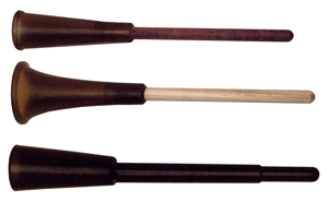 Three woodwind mouthpieces of different lengths and colors laid in a row