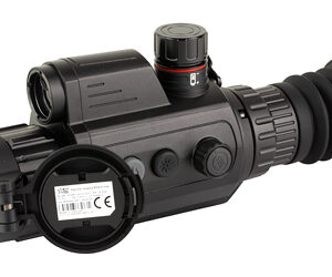 Black tactical riflescope with magnifier attachment and adjustment knobs, shown from the side on a white background.