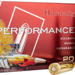 Red Hornady Superformance ammunition box (20 gauge) with three brass bullets beside it on a white background.
