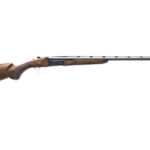 Long-barreled hunting rifle with wooden stock and iron sights, facing to the right.