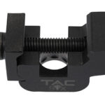 Small black vise clamp with a central threaded screw and adjustment knob, used to hold objects firmly.