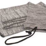 Two gray knit scarves with a black drawstring, folded and stacked on a white background.