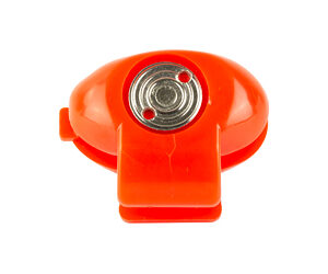Orange plastic whistle with a round metal mouthpiece in the center and a small red dot above it.