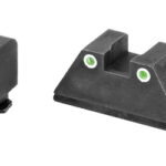 Two black leveling blocks with integrated green bubble level indicators for alignment; a small block and a larger base shown side by side.