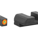 Two firearm sights: a fiber-optic front sight with orange insert and a black rear sight with serrated surface
