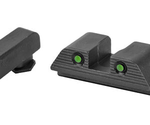 Front sight with orange fiber-optic insert and rear sight with two green fiber-optic dots on a white background; close-up of handgun sights.