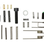 Assorted hardware kit with springs, pins, cotter pins, and retaining clips laid out on a white background.