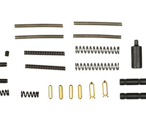 Assorted small hardware parts: silver coil springs, compression springs, gold pins, and black cylindrical components laid out in rows.