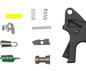 Assortment of small metal hardware parts (springs, pins, clips, screws) next to a black trigger mechanism.