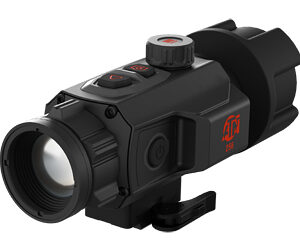 Black tactical red dot sight with lens facing forward, top adjustment knobs, and a mounting clamp on a rail base.