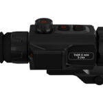 Black tactical rifle scope with adjustable turrets and ribbed eyepiece, labeled 'THOR 6 min 3-24x'