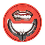 Red circular safety cap with a metal inner ring and a clear center window