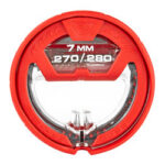 Round red device with a clear window showing the text '7 MM 270/280' and visible metal interior components; appears to be a precision tool or component.