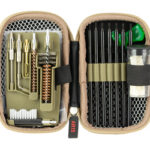 Open zippered tool case with precision repair tools: left side has small screwdrivers, picks, and brushes; right side holds pins and a small bottle secured by elastic bands.