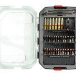 Compact screwdriver bit set in a black case with red latches, open to reveal a variety of bits and a small handle guardrail area.