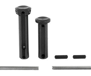 Set of black metal hardware: two tall cylindrical components with holes, two shorter hollow cylinders, two small pins, and two long springs.