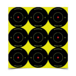 Nine black bullseye targets with red centers arranged in a 3x3 grid on a bright yellow backing.