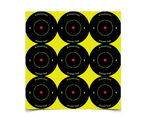 Nine black bullseye targets with red centers arranged in a 3x3 grid on a bright yellow backing.