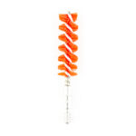 Vertical skewer threaded with orange spiral carrot slices arranged around the rod