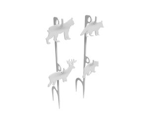 Abstract sculpture of four gray dog silhouettes perched on vertical posts.