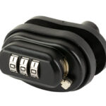 Black travel padlock with three rotating combination dials and a small key at the bottom.