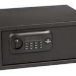 Black electronic safe with keypad lock on the front panel and a handle on the left side.