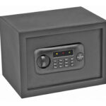 Black metal safe with an electronic keypad lock on the door.